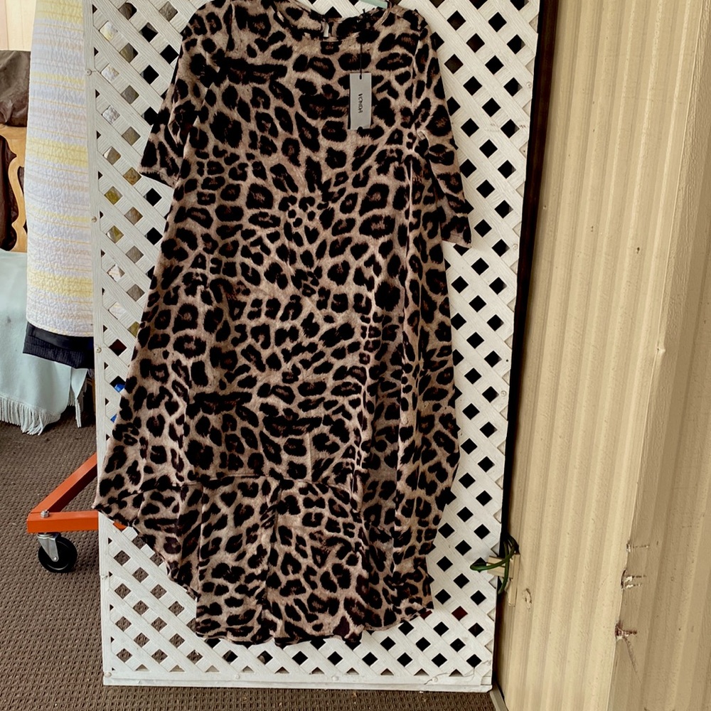 Asymmetrical, animal print dress. Vonda brand. Silky material. Never worn